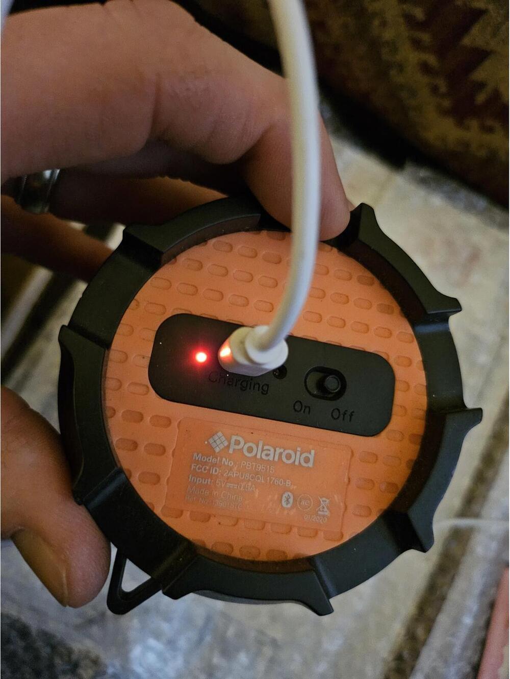 Polaroid auxiliary plug in speaker. Powers on. No cord to test sound. As is